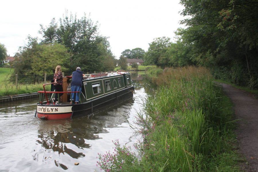 Narrowboat approaching Macclesfield on the Macclesfield Canal